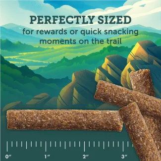 Zukes Adventure Sticks dog treats shown with a ruler. Perfectly sized for rewards or quick snacking moments on the trail.